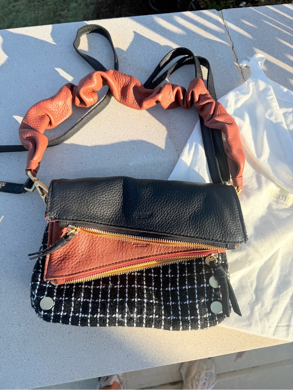 Women’s Hammit Multi-Texture Crossbody Bag in Black and Rust